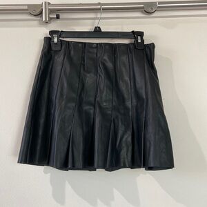 Black leather pleaded skirt